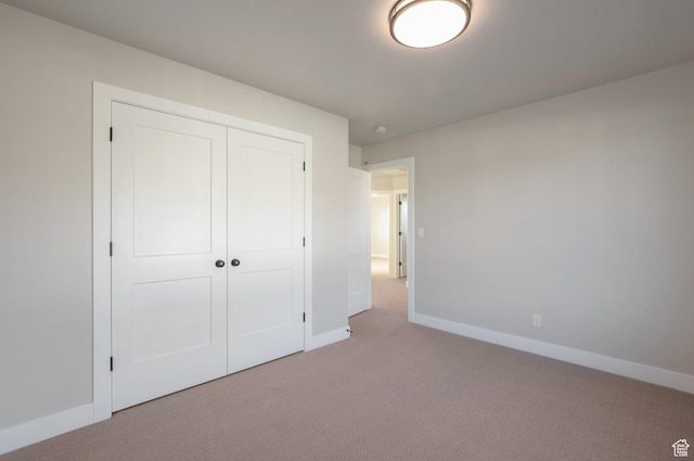 514 S 1450 W, Farmington, UT 84025 - unfurnished bedroom featuring carpet flooring, baseboards, and a closet