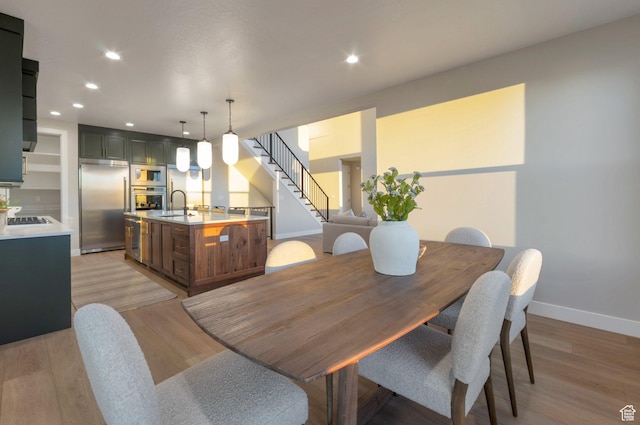 514 S 1450 W, Farmington, UT 84025 - dining room with stairway, light wood-style flooring, recessed lighting, and baseboards