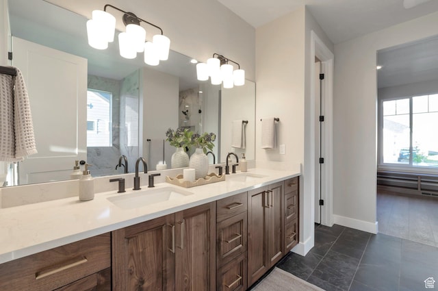 514 S 1450 W, Farmington, UT 84025 - bathroom featuring a walk in shower, baseboards, and double vanity