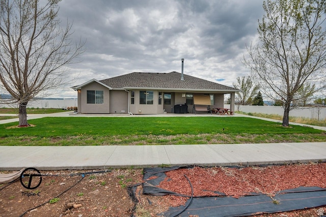 249 E 1800 N, Beaver, UT 84713 - single story home with stucco siding and a patio area