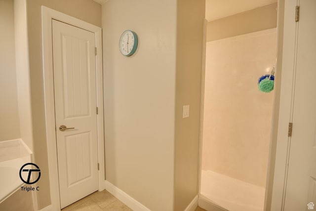 249 E 1800 N, Beaver, UT 84713 - full bathroom featuring tile patterned flooring, a garden tub, and baseboards