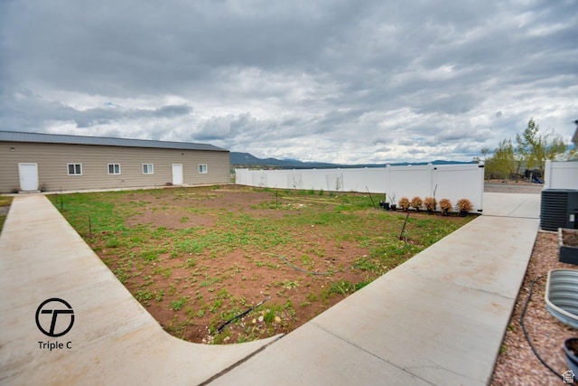 249 E 1800 N, Beaver, UT 84713 - view of yard featuring fence and central AC unit