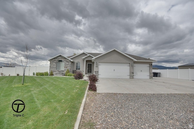 249 E 1800 N, Beaver, UT 84713 - ranch-style house with stucco siding, an attached garage, stone siding, and driveway