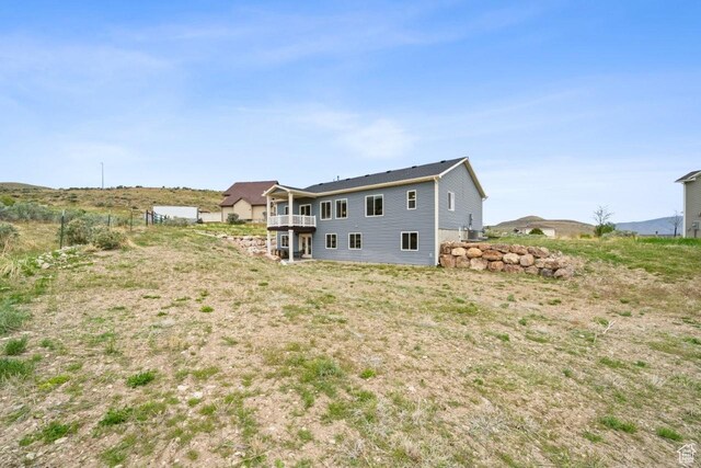 12735 W Kimberly Cir, Tremonton, UT 84337 - rear view of house with a balcony