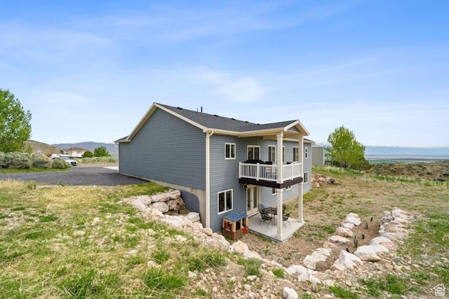 12735 W Kimberly Cir, Tremonton, UT 84337 - view of side of property featuring a patio area and a deck