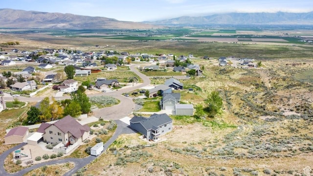 12735 W Kimberly Cir, Tremonton, UT 84337 - drone / aerial view featuring a mountain view and a residential view