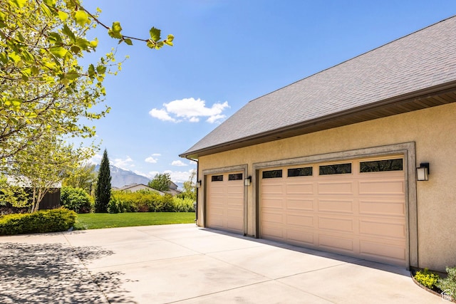 65 W Carnesecca Ct N, Mapleton, UT 84664 - garage featuring concrete driveway