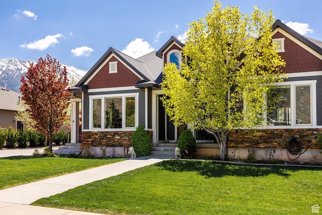 65 W Carnesecca Ct N, Mapleton, UT 84664 - craftsman house featuring a front lawn, entry steps, and stone siding