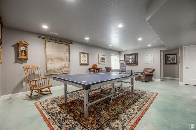 65 W Carnesecca Ct N, Mapleton, UT 84664 - rec room featuring baseboards, recessed lighting, visible vents, and concrete flooring