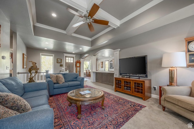 65 W Carnesecca Ct N, Mapleton, UT 84664 - living area with ornate columns, beam ceiling, arched walkways, light colored carpet, and ornamental molding