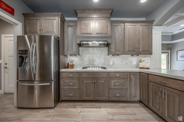 65 W Carnesecca Ct N, Mapleton, UT 84664 - kitchen featuring stainless steel appliances, tasteful backsplash, wood finish floors, recessed lighting, and crown molding