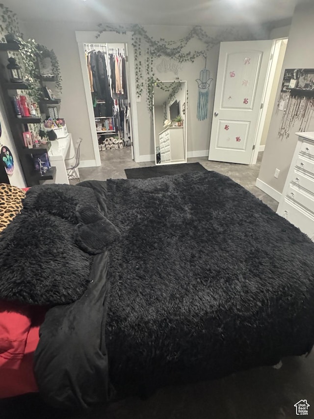 bedroom featuring baseboards