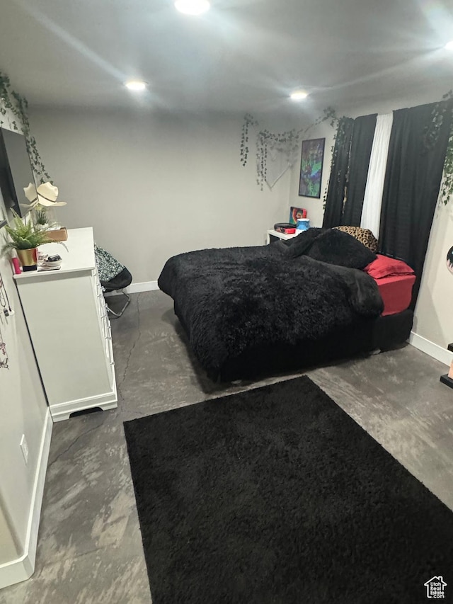 bedroom with baseboards