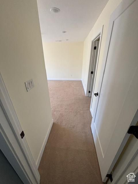 2577 W 5300 N Unit 11, Cedar City, UT 84721 - corridor featuring carpet floors and baseboards