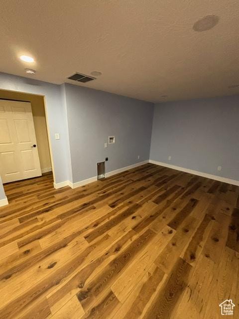 2577 W 5300 N Unit 11, Cedar City, UT 84721 - spare room with wood finished floors, baseboards, a textured ceiling, and recessed lighting