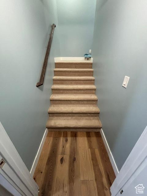 2577 W 5300 N Unit 11, Cedar City, UT 84721 - stairway with wood finished floors and baseboards