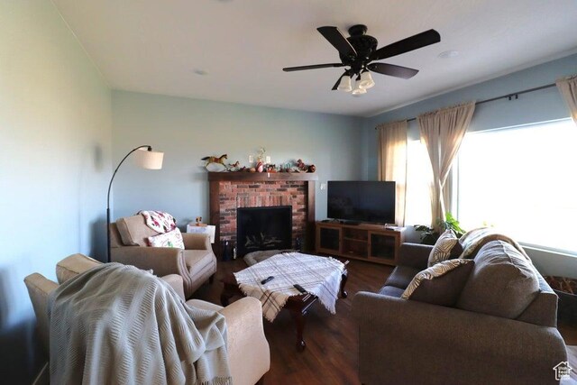2577 W 5300 N Unit 11, Cedar City, UT 84721 - living area featuring a ceiling fan, a brick fireplace, and wood finished floors