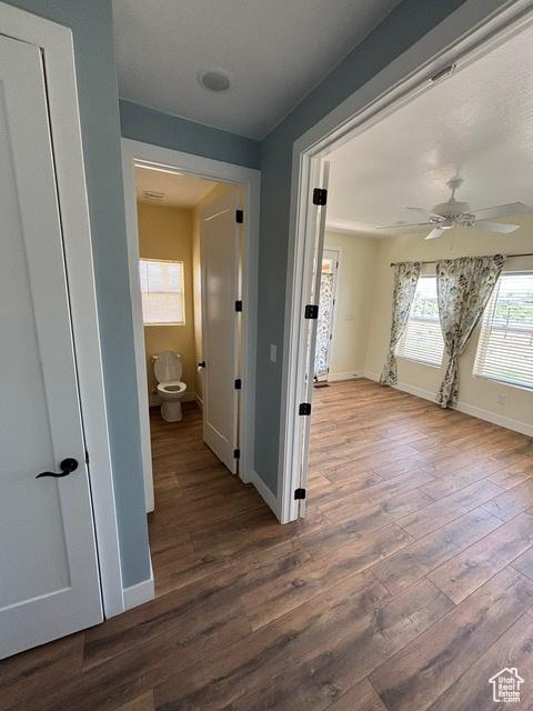 2577 W 5300 N Unit 11, Cedar City, UT 84721 - hallway featuring wood finished floors and baseboards
