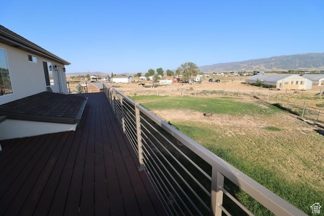 2577 W 5300 N Unit 11, Cedar City, UT 84721 - wooden terrace featuring a lawn and a mountain view