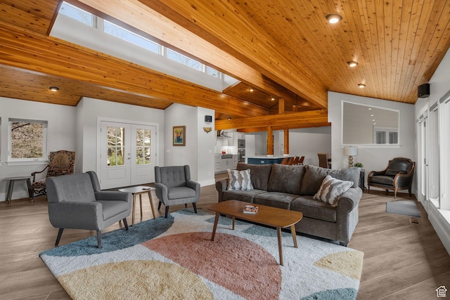 1303 Country Ln, Kamas, UT 84036 - living area with wood ceiling, wood finished floors, vaulted ceiling with skylight, baseboards, and recessed lighting