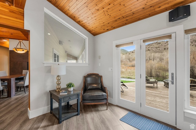 1303 Country Ln, Kamas, UT 84036 - doorway to outside featuring wood ceiling, wood finished floors, and baseboards