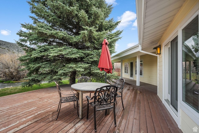 1303 Country Ln, Kamas, UT 84036 - wooden deck featuring outdoor dining area