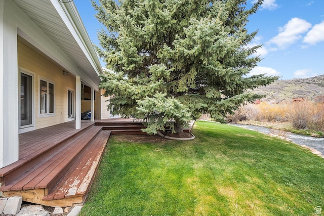 1303 Country Ln, Kamas, UT 84036 - view of yard featuring a deck with mountain view