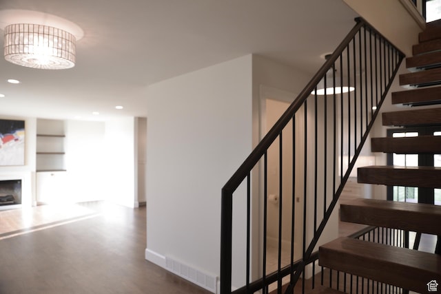 1040 N Oakmont Ln, Provo, UT 84604 - stairs featuring baseboards, recessed lighting, visible vents, and wood finished floors