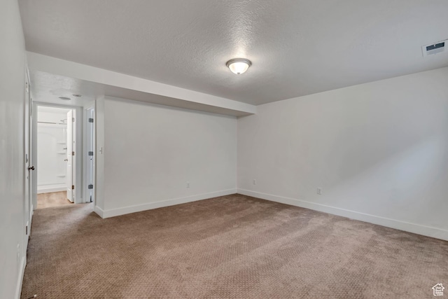1679 S 1355 E Unit A21, Ogden, UT 84404 - carpeted empty room with baseboards and a textured ceiling