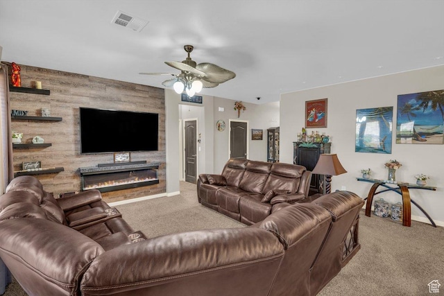 3322 W Bonita, Hurricane, UT 84737 - carpeted living room featuring wood walls, visible vents, an accent wall, ceiling fan, and baseboards