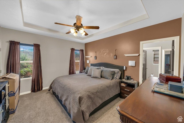 3322 W Bonita, Hurricane, UT 84737 - bedroom with baseboards, a raised ceiling, ceiling fan, and light colored carpet