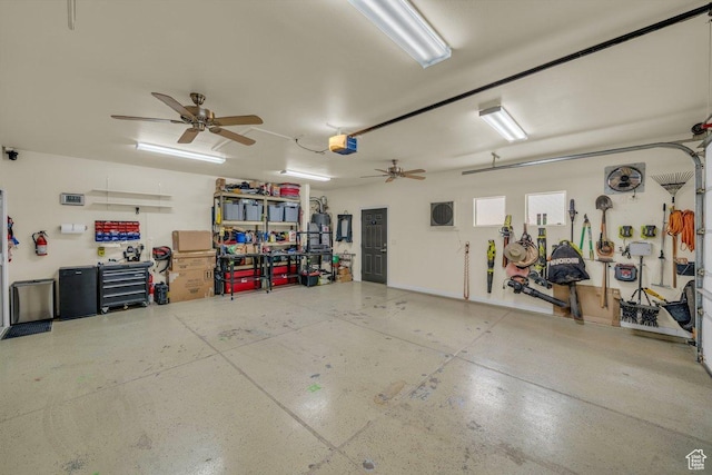 3322 W Bonita, Hurricane, UT 84737 - garage featuring a ceiling fan, a garage door opener, and a workshop area