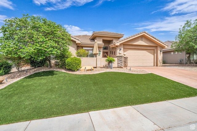 3322 W Bonita, Hurricane, UT 84737 - prairie-style house featuring driveway, an attached garage, stucco siding, a tile roof, and a front yard