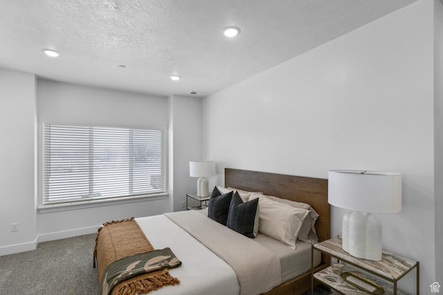 3085 S 225 W Unit 204, Nibley, UT 84321 - bedroom with a textured ceiling, carpet flooring, baseboards, and recessed lighting