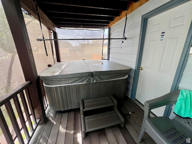exterior space featuring a hot tub