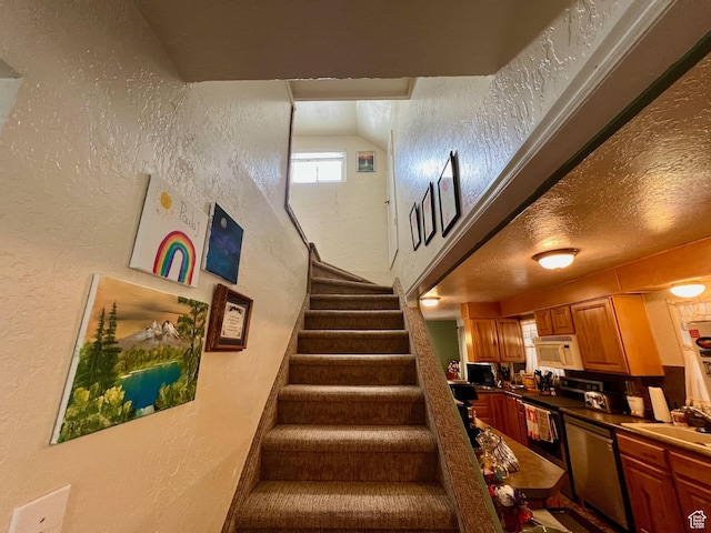 stairs with a textured wall