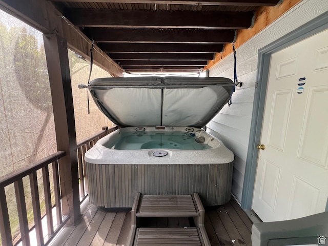 exterior space featuring a hot tub