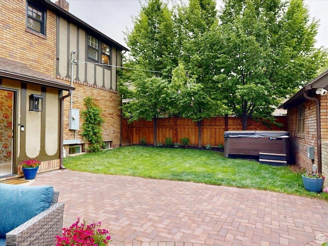 1704 E Herbert Ave, Salt Lake City, UT 84108 - view of yard with a hot tub, a patio area, and a fenced backyard