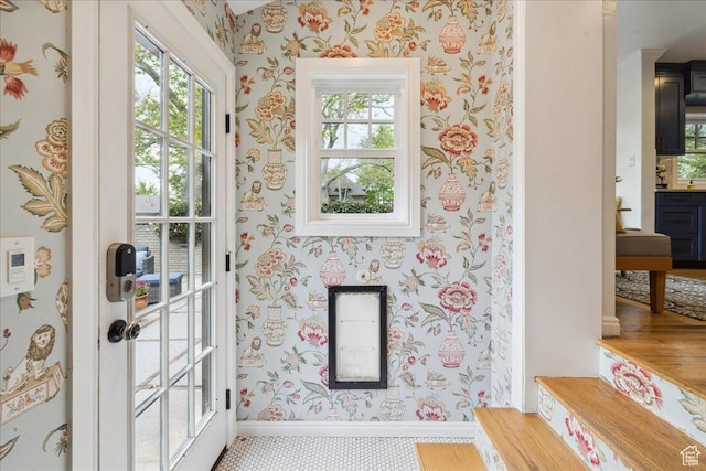 1704 E Herbert Ave, Salt Lake City, UT 84108 - entryway featuring wallpapered walls, a wealth of natural light, and baseboards