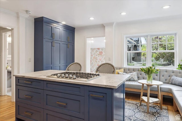 1704 E Herbert Ave, Salt Lake City, UT 84108 - kitchen featuring stainless steel gas stovetop, ornamental molding, and light wood-type flooring
