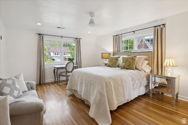 1704 E Herbert Ave, Salt Lake City, UT 84108 - bedroom featuring recessed lighting, baseboards, visible vents, and wood finished floors