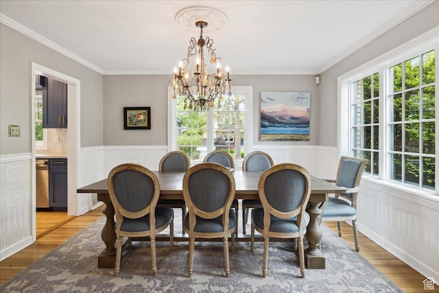 1704 E Herbert Ave, Salt Lake City, UT 84108 - dining room featuring an inviting chandelier, plenty of natural light, and a wainscoted wall