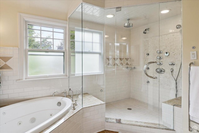 1704 E Herbert Ave, Salt Lake City, UT 84108 - bathroom featuring a stall shower, a wealth of natural light, and a whirlpool tub