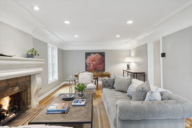 1704 E Herbert Ave, Salt Lake City, UT 84108 - living room with a fireplace, crown molding, baseboards, light wood-style floors, and recessed lighting
