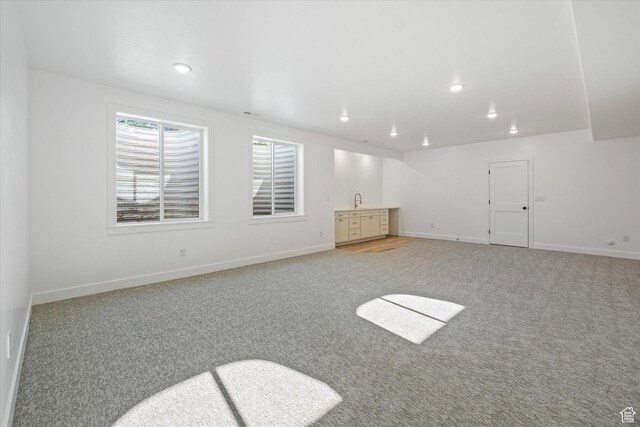 108 N 900 E, Hyde Park, UT 84318 - interior space with light colored carpet, baseboards, and recessed lighting