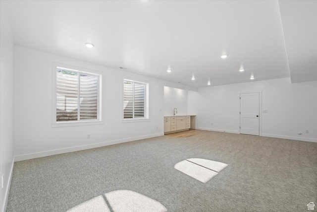 108 N 900 E, Hyde Park, UT 84318 - interior space featuring baseboards, light carpet, and recessed lighting