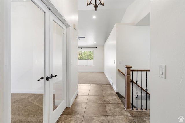 635 N 460 E, Ephraim, UT 84627 - corridor featuring french doors, carpet, baseboards, tile patterned flooring, and an upstairs landing