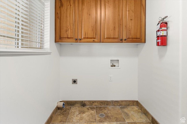 635 N 460 E, Ephraim, UT 84627 - laundry area with cabinet space, washer hookup, stone finish floor, hookup for an electric dryer, and baseboards