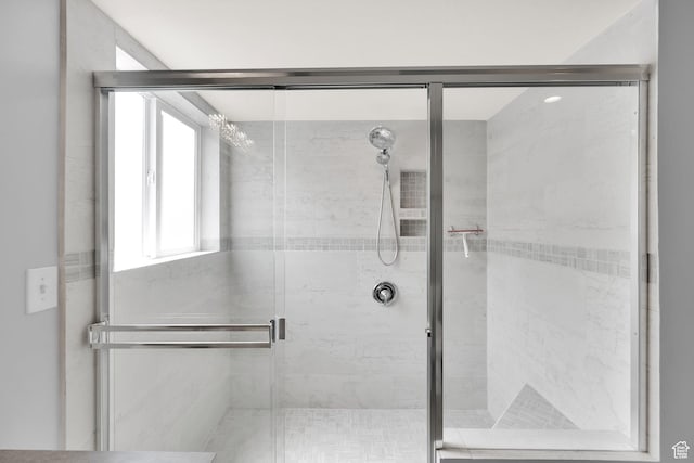bathroom featuring a stall shower