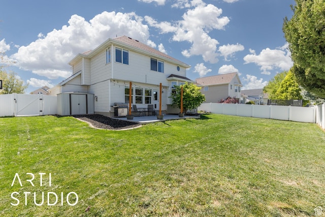 back of property featuring a yard, a patio area, a fenced backyard, and a gate